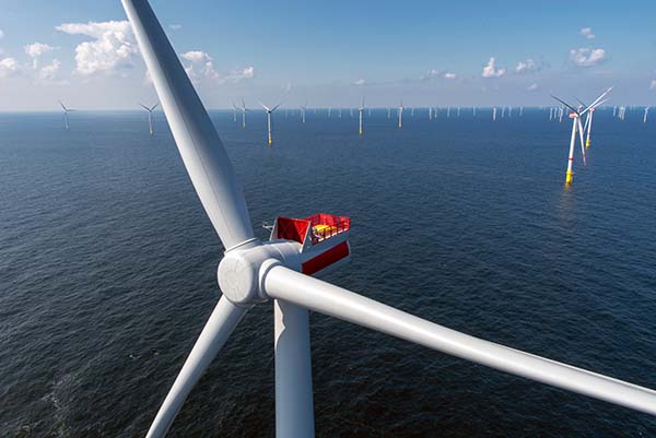 Who covers the cost when offshore wind power can’t get to land?